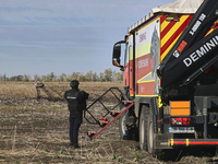 A rescuer works on humanitarian demining using the latest remote control equipment in the Kharkiv region, Ukraine, on October 23, 2024. (