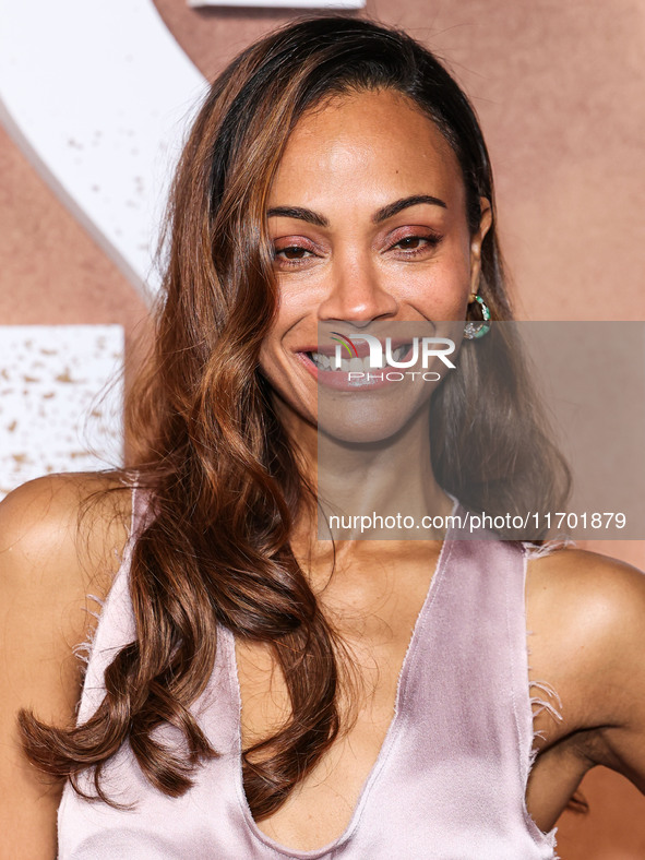 Zoe Saldana wearing Balmain SS25 RTW arrives at the Los Angeles Premiere Of Paramount+'s Original Series 'Lioness' Season 2 held at the Acad...