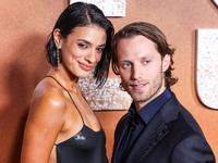 Laysla De Oliveira and partner Jonathan Keltz arrive at the Los Angeles Premiere Of Paramount+'s Original Series 'Lioness' Season 2 held at...