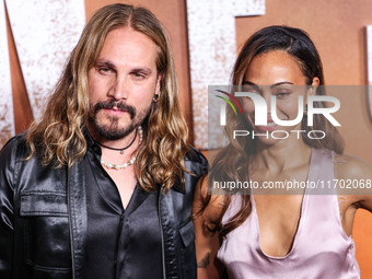 Marco Perego-Saldana and wife Zoe Saldana arrive at the Los Angeles Premiere Of Paramount+'s Original Series 'Lioness' Season 2 held at the...