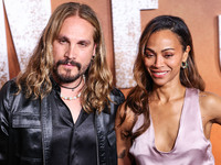 Marco Perego-Saldana and wife Zoe Saldana arrive at the Los Angeles Premiere Of Paramount+'s Original Series 'Lioness' Season 2 held at the...