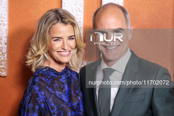 Karyn Kelly and husband Michael Kelly arrive at the Los Angeles Premiere Of Paramount+'s Original Series 'Lioness' Season 2 held at the Acad...