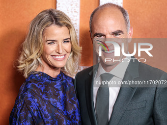 Karyn Kelly and husband Michael Kelly arrive at the Los Angeles Premiere Of Paramount+'s Original Series 'Lioness' Season 2 held at the Acad...