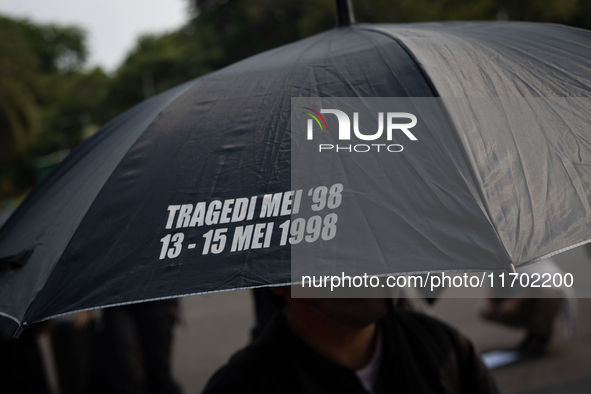 Human rights activists participate in the 837th Aksi Kamisan, or Thursday's Protest, in front of the Merdeka Palace in Jakarta, Indonesia, o...