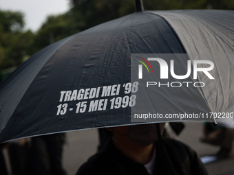 Human rights activists participate in the 837th Aksi Kamisan, or Thursday's Protest, in front of the Merdeka Palace in Jakarta, Indonesia, o...