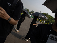 Human rights activists participate in the 837th Aksi Kamisan, or Thursday's Protest, in front of the Merdeka Palace in Jakarta, Indonesia, o...