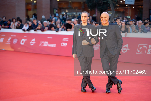 Gianmarco Franchini and Luca Zingaretti attend the ''La Casa Degli Sguardi'' red carpet during the 19th Rome Film Festival at Auditorium Par...