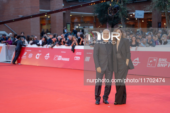 Luca Zingaretti and Luisa Ranieri attend the ''La Casa Degli Sguardi'' red carpet during the 19th Rome Film Festival at Auditorium Parco Del...