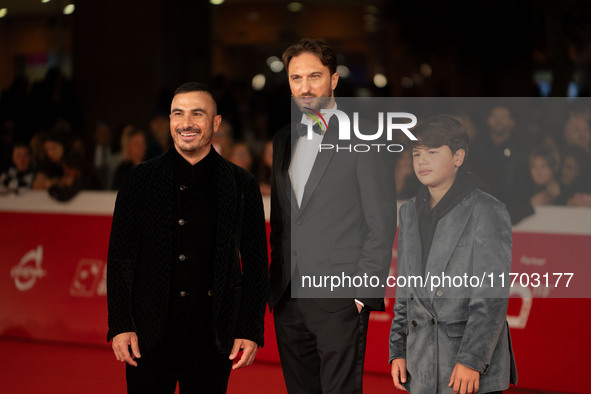 Francesco Di Leva, Giuseppe Miale Di Mauro, and Mario Di Leva attend the ''Nottefonda'' red carpet during the 19th Rome Film Festival at Aud...