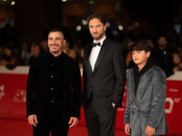 Francesco Di Leva, Giuseppe Miale Di Mauro, and Mario Di Leva attend the ''Nottefonda'' red carpet during the 19th Rome Film Festival at Aud...