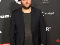 Marshall, a German actor, poses on the red carpet before the closing award ceremony of the Cologne Film Festival 2024 at E-Werk in Cologne,...