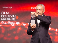 Udo Kier, a German actor, receives the international actors award during the closing award ceremony of the Cologne Film Festival 2024 at E-W...