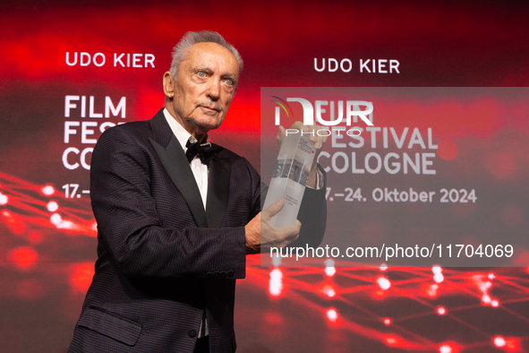 Udo Kier, a German actor, receives the international actors award during the closing award ceremony of the Cologne Film Festival 2024 at E-W...