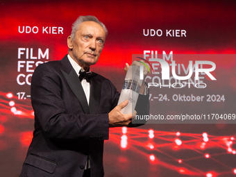 Udo Kier, a German actor, receives the international actors award during the closing award ceremony of the Cologne Film Festival 2024 at E-W...