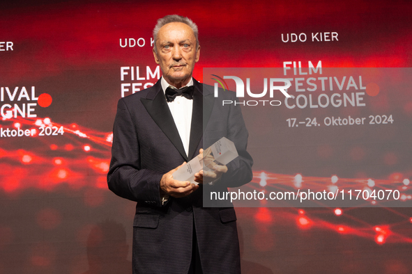 Udo Kier, a German actor, receives the international actors award during the closing award ceremony of the Cologne Film Festival 2024 at E-W...