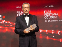 Udo Kier, a German actor, receives the international actors award during the closing award ceremony of the Cologne Film Festival 2024 at E-W...