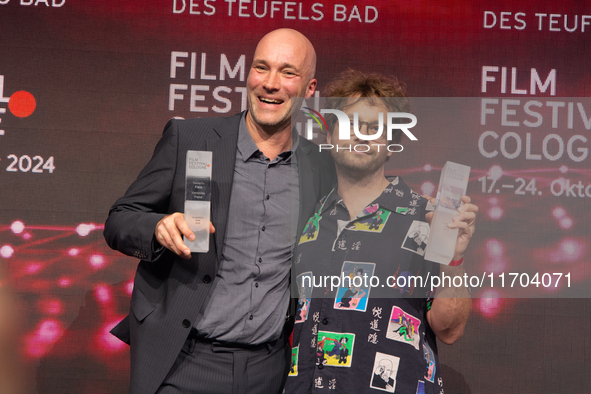 Sascha Verhey and Severin Fiala receive the NRW film prize award during the closing award ceremony of the Cologne Film Festival 2024 at E-We...