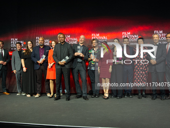 All the award winners take group pictures during the closing award ceremony of the Cologne Film Festival 2024 at E-Werk in Cologne, Germany,...