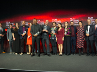 All the award winners take group pictures during the closing award ceremony of the Cologne Film Festival 2024 at E-Werk in Cologne, Germany,...