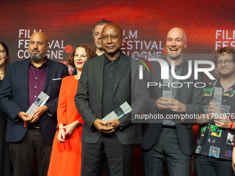 All the award winners take group pictures during the closing award ceremony of the Cologne Film Festival 2024 at E-Werk in Cologne, Germany,...