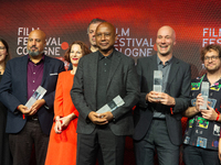 All the award winners take group pictures during the closing award ceremony of the Cologne Film Festival 2024 at E-Werk in Cologne, Germany,...