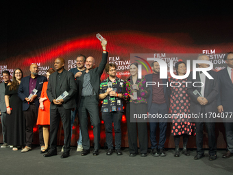 All the award winners take group pictures during the closing award ceremony of the Cologne Film Festival 2024 at E-Werk in Cologne, Germany,...