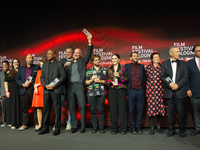 All the award winners take group pictures during the closing award ceremony of the Cologne Film Festival 2024 at E-Werk in Cologne, Germany,...