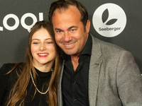 Thomas Becker, the head of program director of Phoenix, and Smilla Felgner, a German actress, pose on the red carpet at E-werk in Cologne, G...