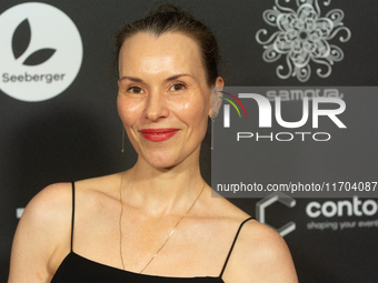 Antonia Bergman, a German actress, poses on the red carpet before the closing award ceremony of the Cologne Film Festival 2024 at E-Werk in...