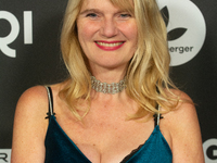 Corinna Nilson, a German actress, poses on the red carpet before the closing award ceremony of the Cologne Film Festival 2024 at E-Werk in C...