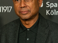 Raoul Peck, a Haitian filmmaker, poses on the red carpet before the closing award ceremony of the Cologne Film Festival 2024 at E-Werk in Co...