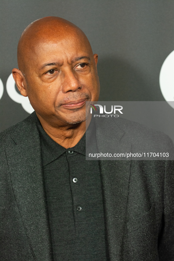 Raoul Peck, a Haitian filmmaker, poses on the red carpet before the closing award ceremony of the Cologne Film Festival 2024 at E-Werk in Co...