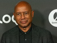 Raoul Peck, a Haitian filmmaker, poses on the red carpet before the closing award ceremony of the Cologne Film Festival 2024 at E-Werk in Co...