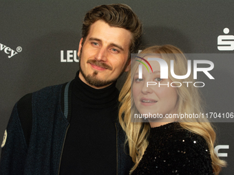 Annina Euling, a German actress, and Michel Kopmann, a German actor, pose on the red carpet before the closing award ceremony of the Cologne...