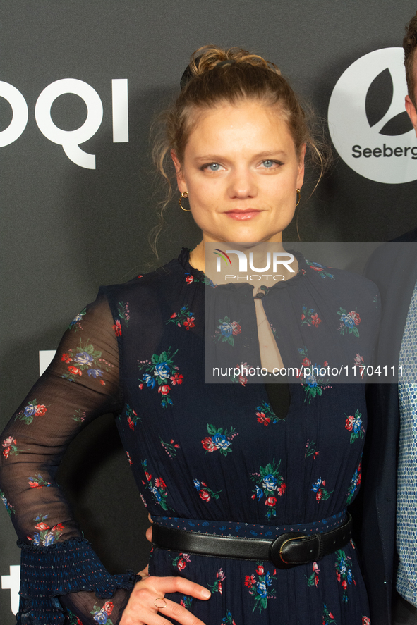 Aline Hochscheid, a German actress, poses on the red carpet before the closing award ceremony of the Cologne Film Festival 2024 at E-Werk in...