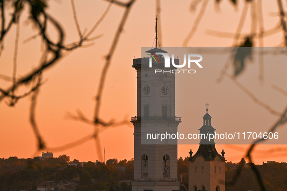 The sun sets over the skyline of Lviv in Lviv, Ukraine, on October 24, 2024. NO USE RUSSIA. NO USE BELARUS. 