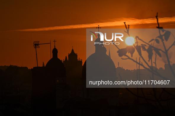 The sun sets over the skyline of Lviv in Lviv, Ukraine, on October 24, 2024. NO USE RUSSIA. NO USE BELARUS. 