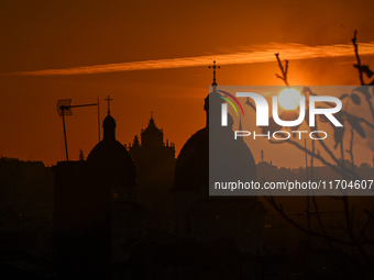 The sun sets over the skyline of Lviv in Lviv, Ukraine, on October 24, 2024. NO USE RUSSIA. NO USE BELARUS. (