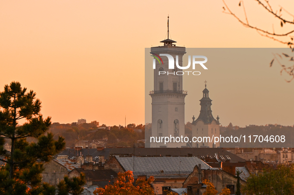 The sun sets over the skyline of Lviv in Lviv, Ukraine, on October 24, 2024. NO USE RUSSIA. NO USE BELARUS. 