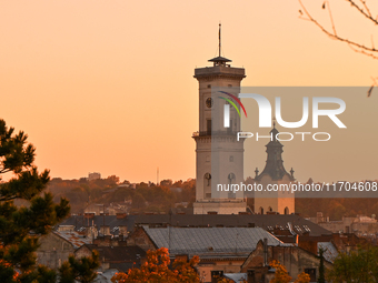 The sun sets over the skyline of Lviv in Lviv, Ukraine, on October 24, 2024. NO USE RUSSIA. NO USE BELARUS. (