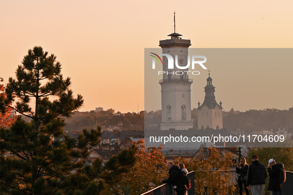 The sun sets over the skyline of Lviv in Lviv, Ukraine, on October 24, 2024. NO USE RUSSIA. NO USE BELARUS. 