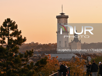 The sun sets over the skyline of Lviv in Lviv, Ukraine, on October 24, 2024. NO USE RUSSIA. NO USE BELARUS. (