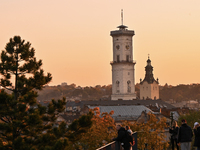 The sun sets over the skyline of Lviv in Lviv, Ukraine, on October 24, 2024. NO USE RUSSIA. NO USE BELARUS. (