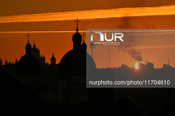 The sun sets over the skyline of Lviv in Lviv, Ukraine, on October 24, 2024. NO USE RUSSIA. NO USE BELARUS. 