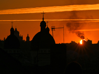 The sun sets over the skyline of Lviv in Lviv, Ukraine, on October 24, 2024. NO USE RUSSIA. NO USE BELARUS. (