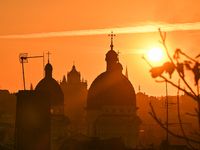 The sun sets over the skyline of Lviv in Lviv, Ukraine, on October 24, 2024. NO USE RUSSIA. NO USE BELARUS. (