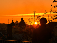 The sun sets over the skyline of Lviv in Lviv, Ukraine, on October 24, 2024. NO USE RUSSIA. NO USE BELARUS. (