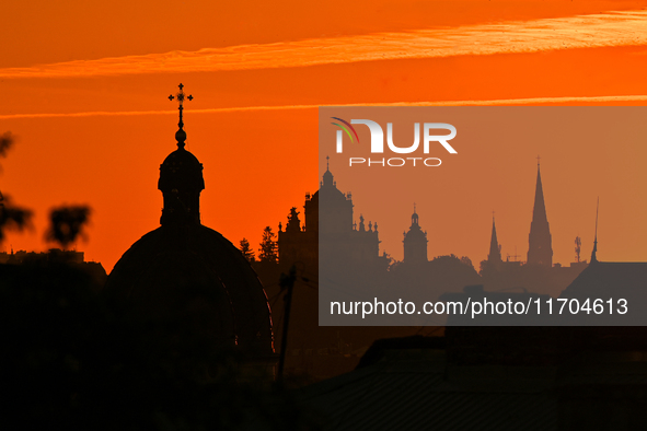 The sun sets over the skyline of Lviv in Lviv, Ukraine, on October 24, 2024. NO USE RUSSIA. NO USE BELARUS. 