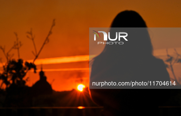 The sun sets over the skyline of Lviv in Lviv, Ukraine, on October 24, 2024. NO USE RUSSIA. NO USE BELARUS. 