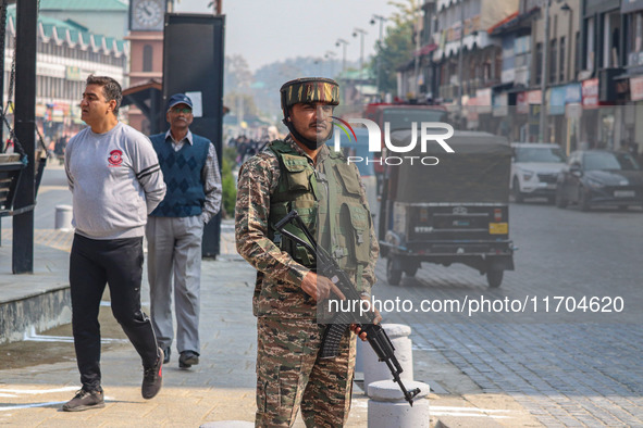 An Indian security personnel stands guard along a road in Srinagar, Jammu and Kashmir, on October 25, 2024. Security is increased across Kas...